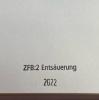 Stempel "Entsäuerung 2022" auf einem Archivkarton.